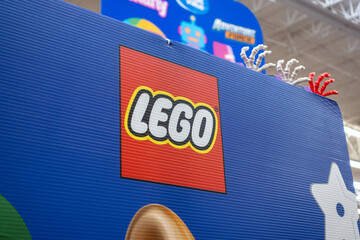 Naklejka premium Lego logo, owned by The Lego Group, inside the toy section of a supermarket. Jalisco, Mexico, July 20, 2026.