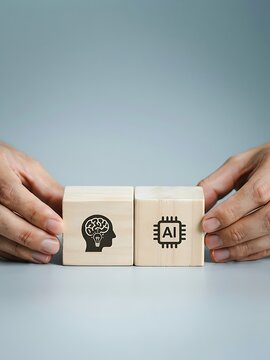 Human hands holding wooden blocks with artificial intelligence and brain symbols
