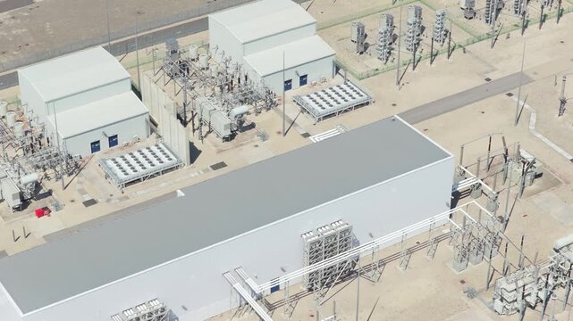 Industrial Power Station Equipment and Grid From Above at Midday