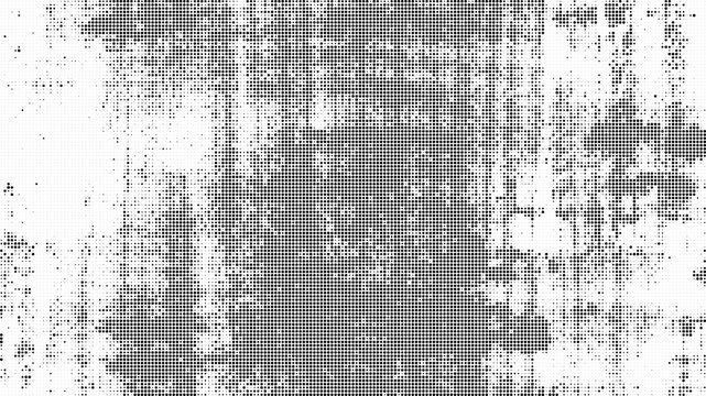 Halftone pattern with black dots on white background texture
