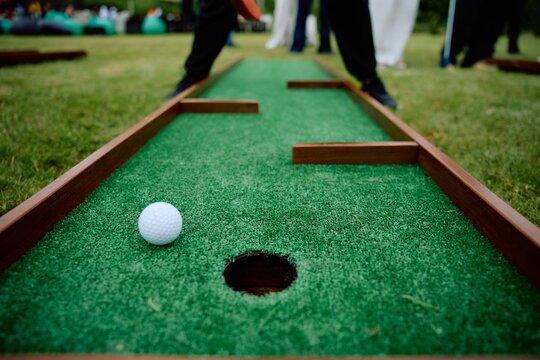 Golf Ball on Outdoor Mini Golf Course Green Putting Surface