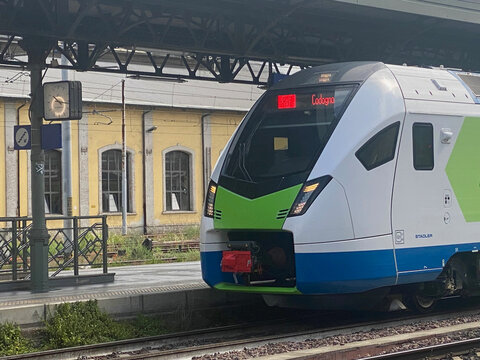 Stadler train arriving at Cremona station, destination Codogno, public transport in northern Italy
