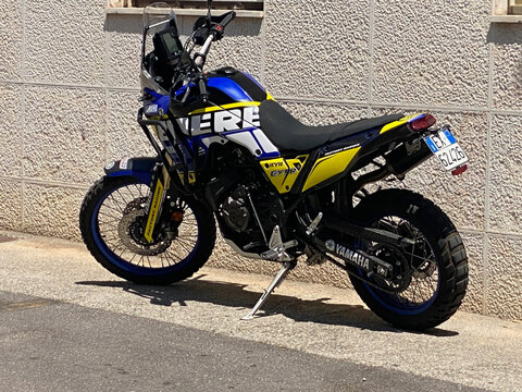 Yamaha Tenere 700 adventure motorcycle parked on Via Palio dell'Oca street, Cremona, Italy