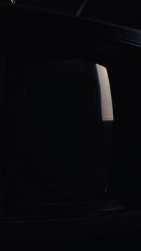 Vintage cathode ray tube television turning on to solid green chroma key screen with analog static noise before powering off to black