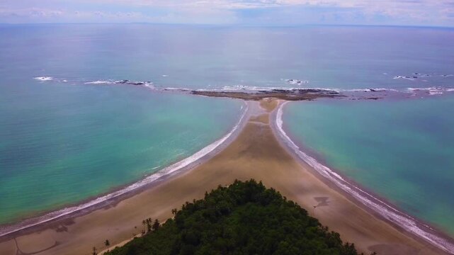Aerial drone view of Whale Tail Beach in Marino Ballena National Park, Uvita, Costa Rica