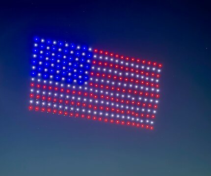 Colorful drone light show event featuring the American stars and stripes flag