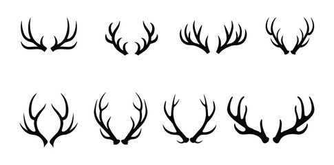 Naklejka premium Antler Silhouettes Collection. A graphic collection showcasing a variety of stylized antler silhouettes, presented in a clean, minimalist design for versatile use.