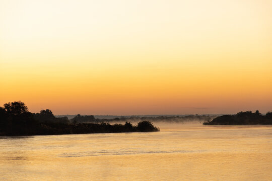 sunrise on the Zambezi River, Zimbabwe, Africa