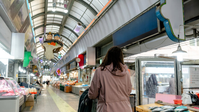 Woman exploring Seong-dong Market in Gyeongju, Korea