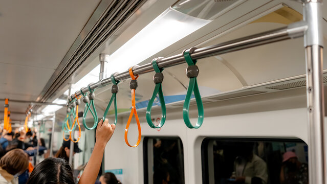 Interior view of Kaohsiung subway train with hand strap