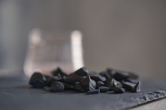  natural shungite stones for water filtration, purification and wellness concept.