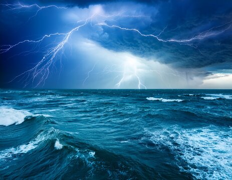 vast ocean surface with lightning storm and choppy waves in turquoise and blue shades