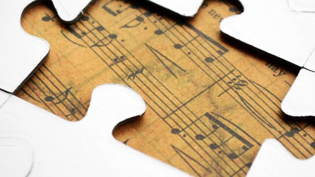 Vintage Music Sheet Puzzle Piece Close-Up Symbolizing Creativity and Problem Solving