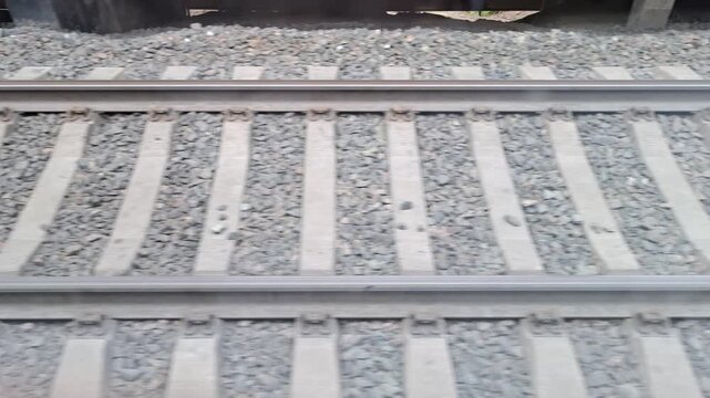 Railroad tracks on gravel outdoors. transport, rail, infrastructure, travel.