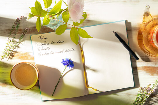 Mindful al fresco journaling with herbal tea and handwriting