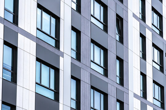 Modern office building facade with repetitive window pattern