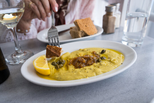 Traditional Greek fava puree with caper and lemon slice