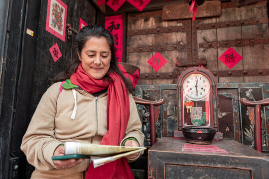 Woman exploring Pingyao's traditional charm