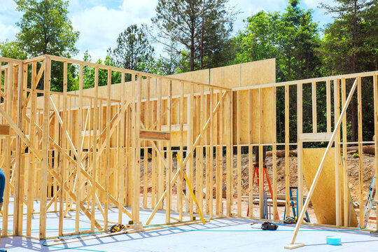 Construction site wooden framing for new building taking shape