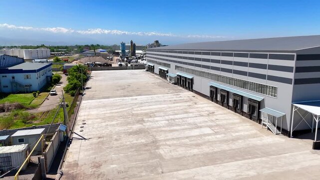 Modern Logistics Warehouse with Loading Docks and Truck Court