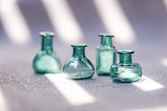 Minimal glass bottle still life with soft window light