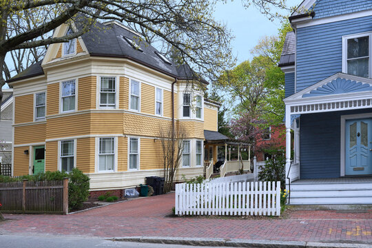 Neighborhood of pastel colored clapboard houses