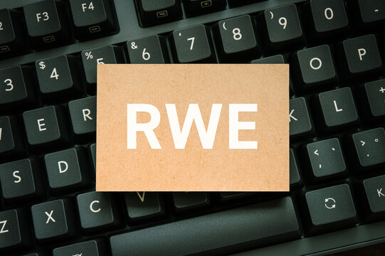 RWE Real World Evidence concept on desk &mdash; ideal eyecatcher for clinical research and drug development articles