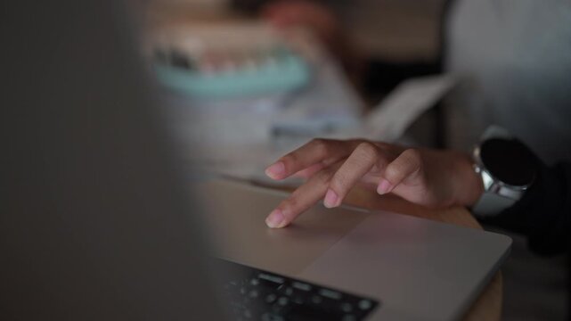 Remote Professional Using Laptop and Managing Business Workflow While Working From Home