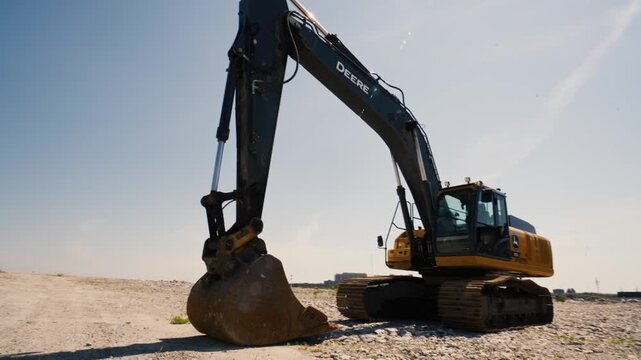 Powerful excavator digs deep into the earth, showcasing its might and skill