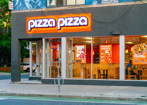 Toronto, ON, Canada - Jun, 28, 2026: Evening view of the Pizza Pizza restaurant located at1193 St W Bloor St W, Toronto, ON, is a Canadian pizza restaurant chain with over 750 locations across Canada