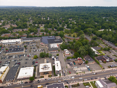 Aerial view suburban downtown shopping complex and residential area