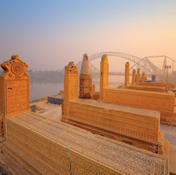 Seven sisters grave and The Lansdowne Bridge, also known as Lens Down Bridge, is a historic cantilever bridge over the Indus River in Sukkur, Pakistan, 