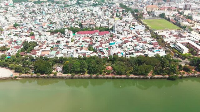 Bien Hoa City, Dong Nai, Vietnam &ndash; 4K aerial drone footage of Dong Nai River, city skyline, riverside neighborhoods, riverside houses, bridge and urban landscape