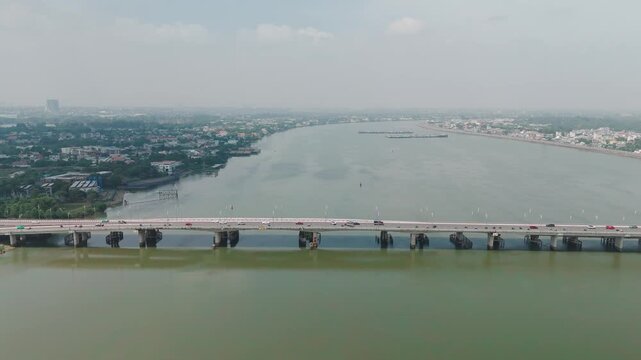 Bien Hoa City, Dong Nai, Vietnam &ndash; 4K aerial drone footage of Dong Nai River, city skyline, riverside neighborhoods, riverside houses, bridge and urban landscape