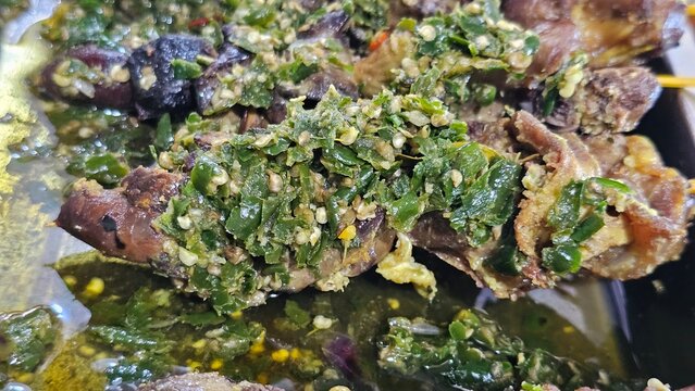Ayam goreng cabe ijo is fried chicken with sambal ijo. Ayam Batokok Cabe Hijau, Indonesian traditional green chili smashed chicken.