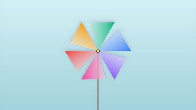 Bright colorful pinwheel graphic rotating smoothly against a soft pastel sky background ideal for festive celebratory motion graphics or abstract presentation backgrounds