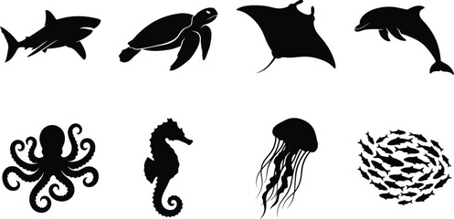 Set of black silhouettes of diverse sea animals including shark, turtle, ray, dolphin, octopus, seahorse, jellyfish, and fish. © Sohel