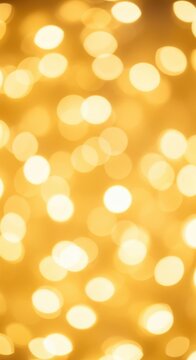 Golden Bokeh Lights Background with Soft Glow Effect.