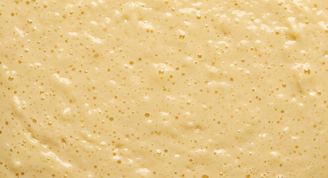 Close-up of Bubbly Batter Texture, Macro Shot of Food Preparation