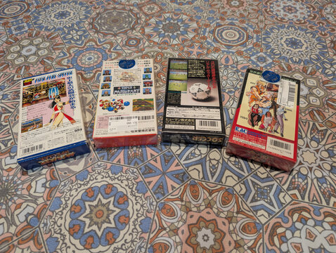 Alberic, Valencia, Spain - July 03, 2026: Rear view of original Japanese Super Famicom game boxes showing packaging design and product information. SNES, Nintendo, back cover, Japan import, NTSC-J.