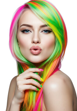Young caucasian woman in avant-garde makeup and hyper-stylized neon hair clutching strands, making a kiss gesture in a high-key studio beauty portrait, sharp focus on eyes. concept of audacious