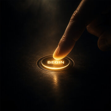 Finger pressing a glowing begin button in darkness creating a dramatic symbol of action motivation fresh starts innovation decision making and the powerful moment when a new journey begins