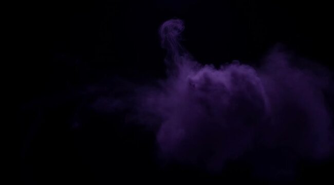 isolated purple smoke cloud dissipating in dark atmosphere, visual effect for motion graphics and compositing projects
