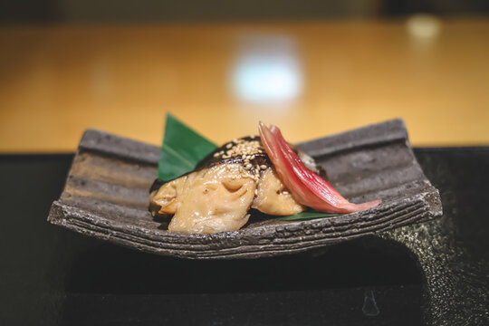 Gourmet Japanese Dish With Sauce, Sesame, and Pink Pickled Ginger Nov 28 2025