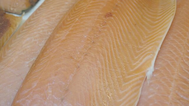 Discovering the beauty of fresh salmon fillets in detail
