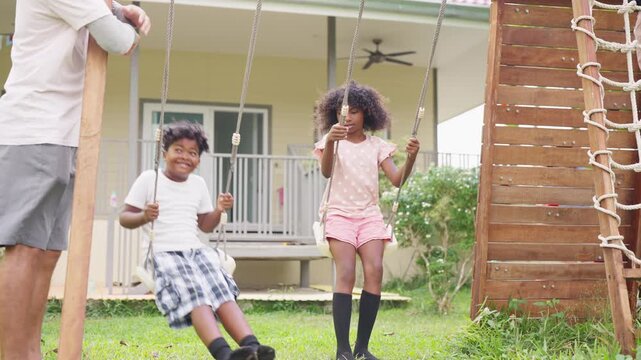 Male school teacher supervising diverse children kid playing outdoors on playground promoting healthy childhood active lifestyle outdoor learning safety teamwork and leisure activities in garden