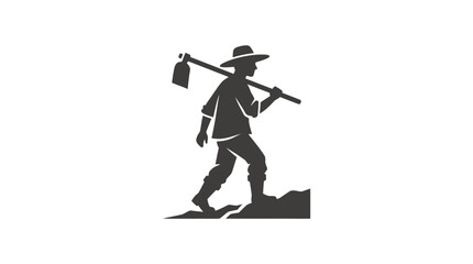Man walking with shovel on shoulder. © Nur