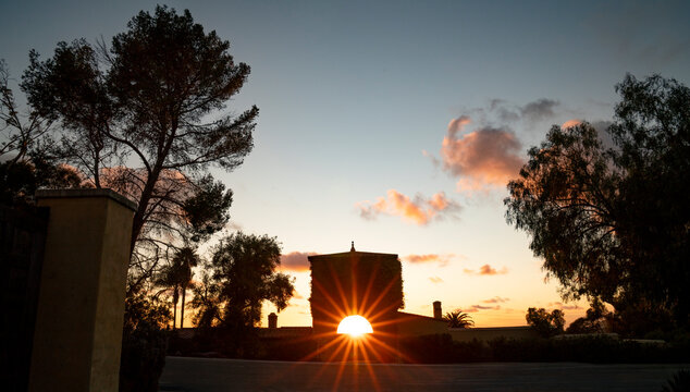 Historic gatehouse at sunset with sunburst effect in Rancho Palos Verdes