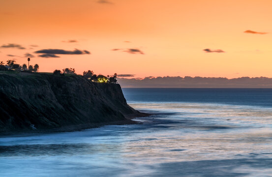Bluff Cove Palos Verdes Estates at sunset with ocean waves and dramatic sky
