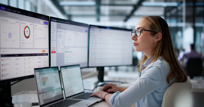 Young Risk Manager Using Laptop